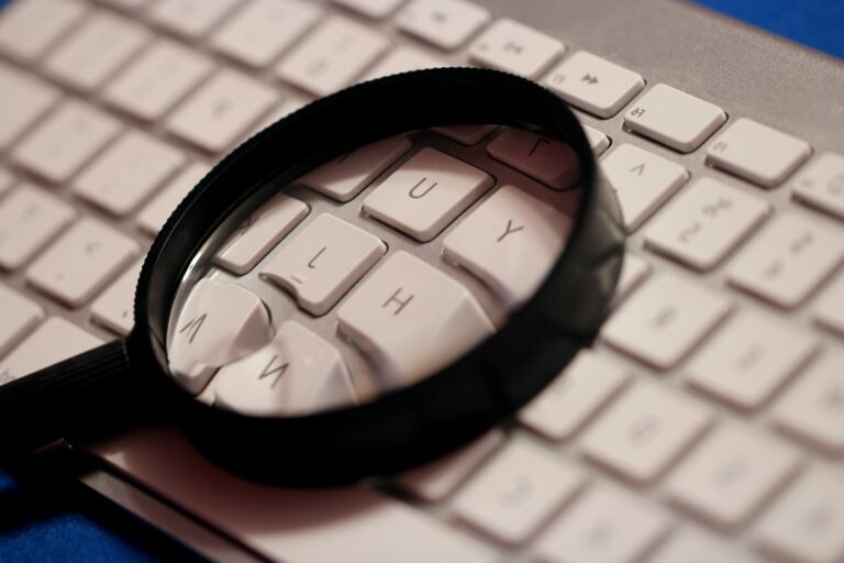Magnifying glass atop tcomputer wireless keyboard